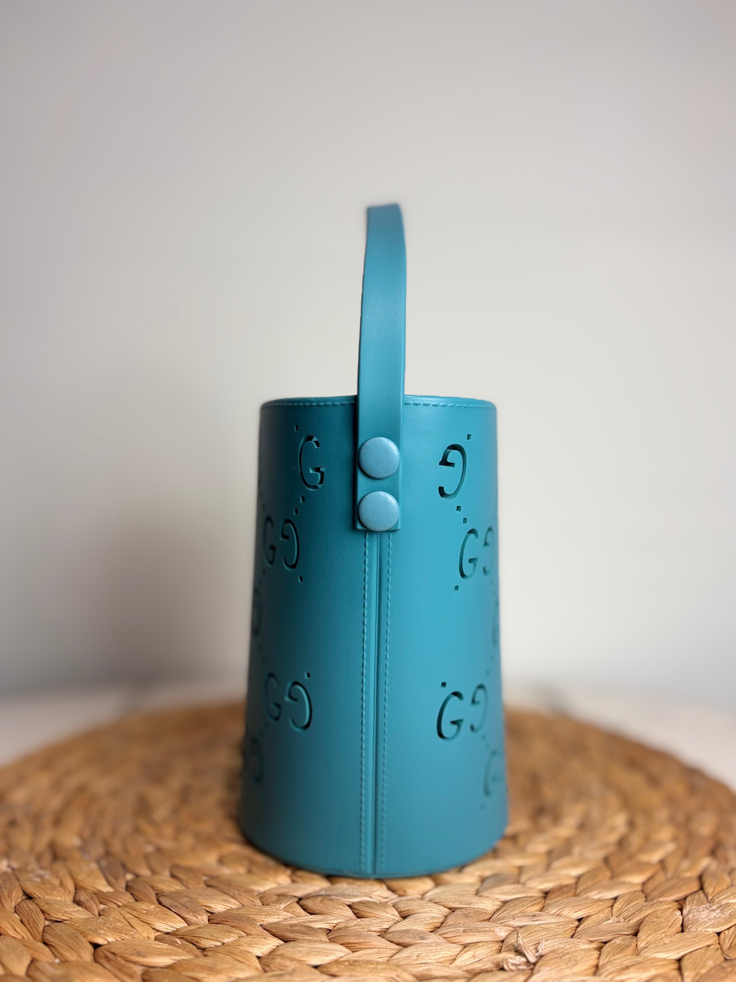 GUCCI Blue GG Perforated Rubber Bucket Bag